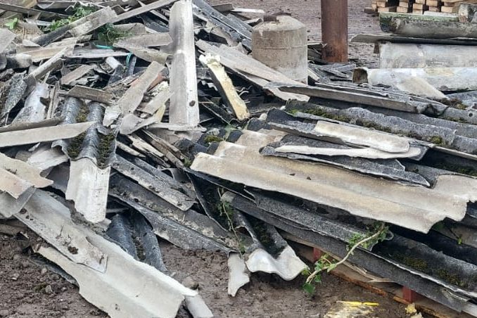 Pile of discarded roofing materials stacked together